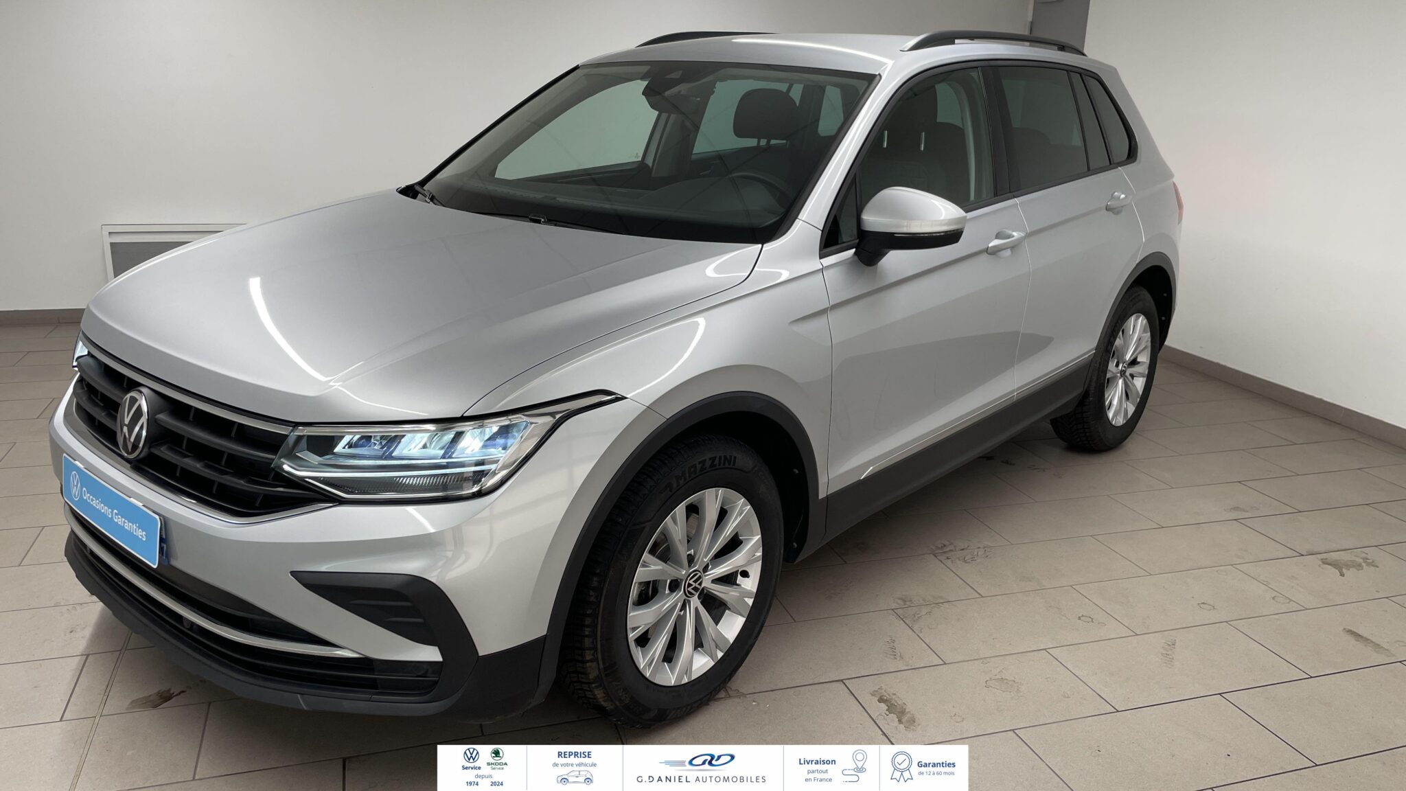 1364518_VOLKSWAGEN_TIGUAN+BUSINESS_34_AVANT_GAUCHE.jpg